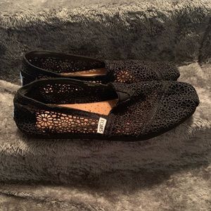 Tom’s black crochet flats